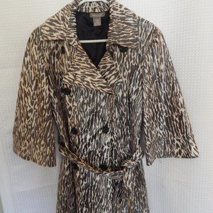 Raincoat, animal print, three quarter length sleeves, pockets, belt.
